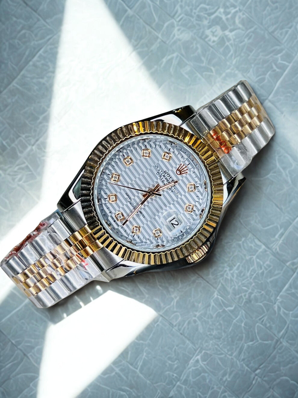 Rolex - DateJust - A Silver Rose Fluted Bezel White Dial Luxury Collection Watch